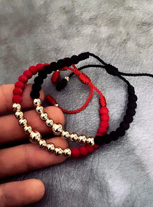 Pareja Sky (Pulsera Negra + Pulsera Roja)